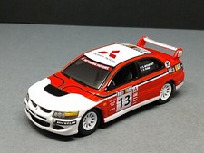 2004 MITSUBISHI LANCER EVO RALLY RACER LIMITED EDITION COLLECTIBLE 1/64 SCALE