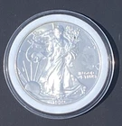 AMERICAN SILVER EAGLE 1999 ONE TROY OUNCE OF .999 FINE SILVER IN CAPSULE