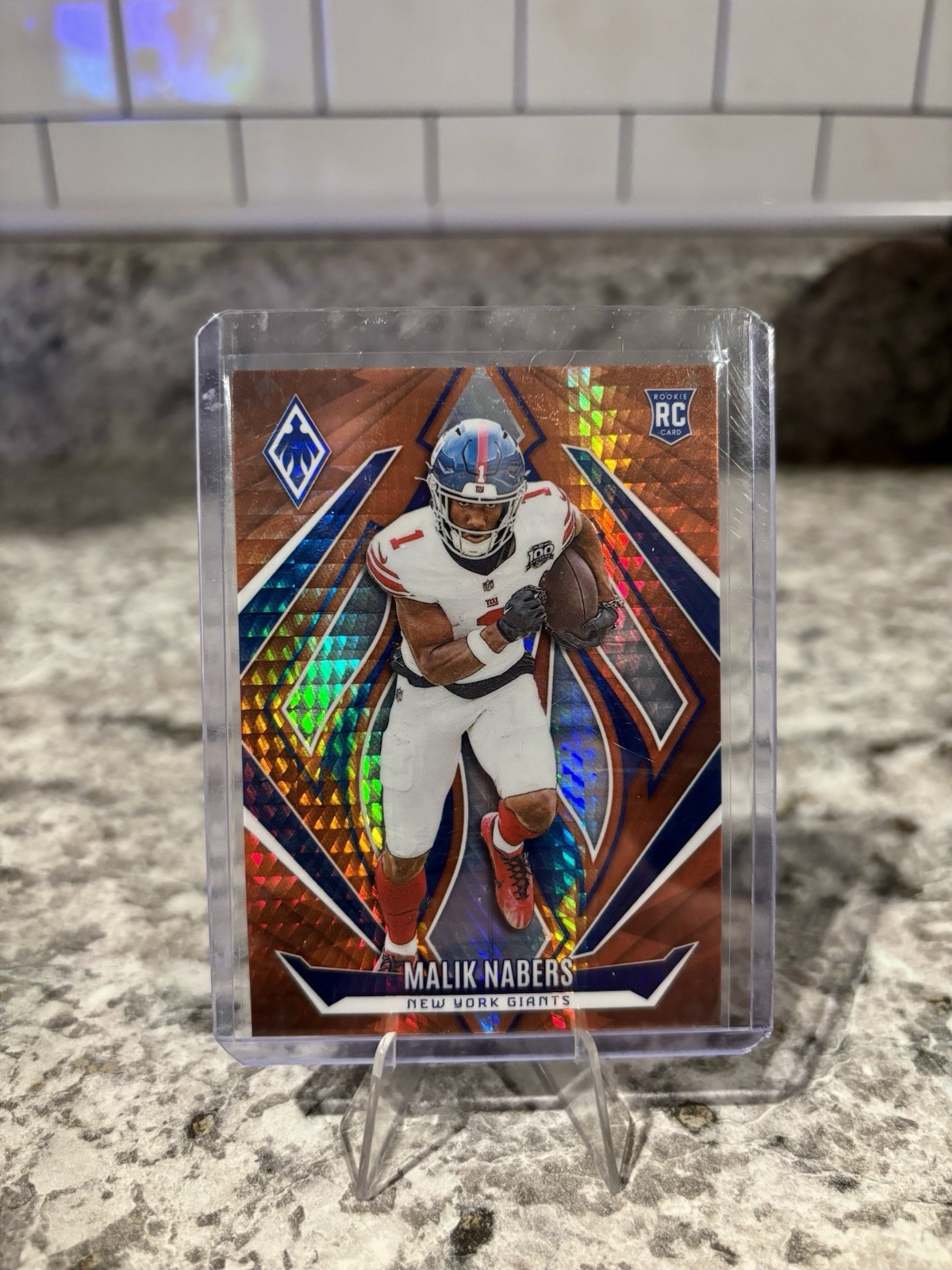 2024 Panini Phoenix - Rookies Malik Nabers #221 Orange Hyper (RC)