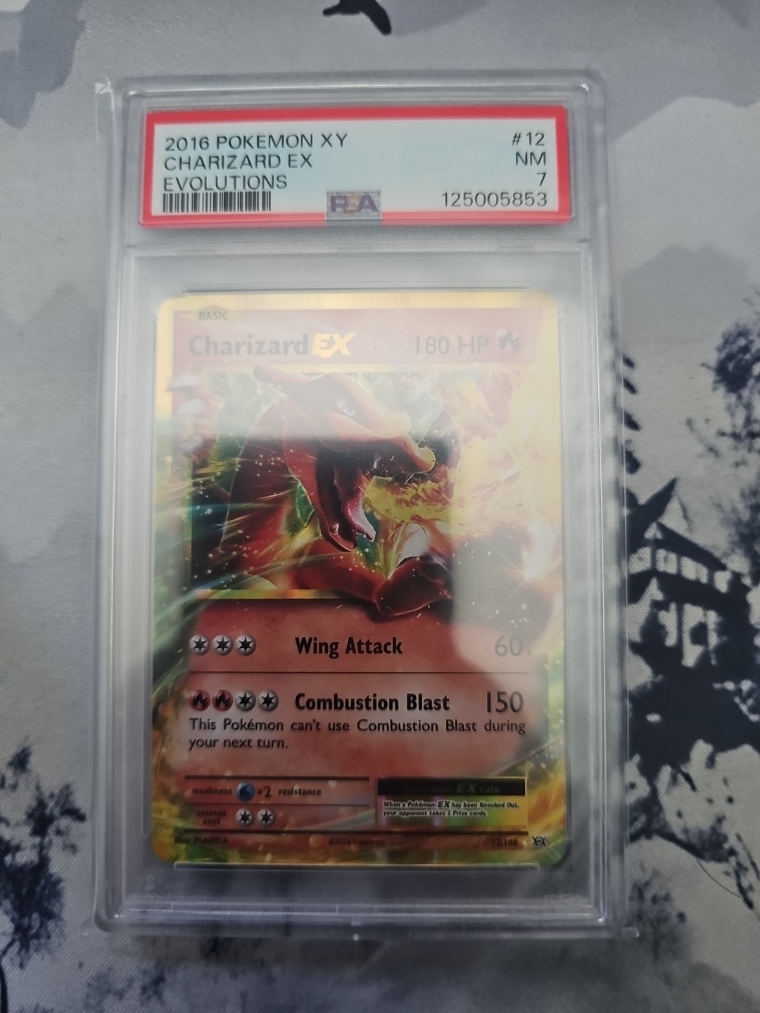 2016 Pokemon XY | Charizard EX #12 Evolutions | PSA NM 7