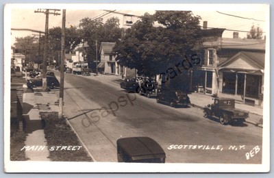 K32/ Scottsville New York RPPC Postcard c1940 Monroe Co Main St Stores 50