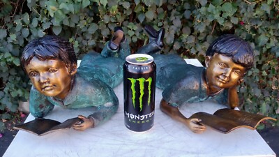 BOY & GIRL LAYING DOWN WITH BOOK BRONZE SCULPTURE FOR PATIO, OUTDOOR DECORATION