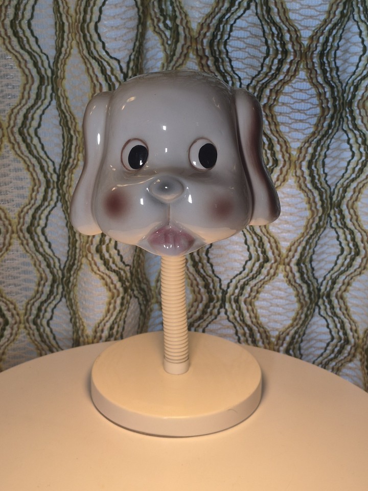 Same unhinged genius as its elephant sibling — a ceramic dog head gooseneck lamp that sits somewhere between mid-century cool and delightful absurdity.