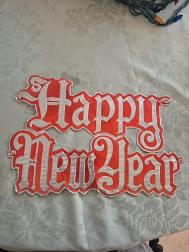 This 1950 Happy New Year 8x12x1 Tin Foil Cut Out. Made In USA  .  packed Away.