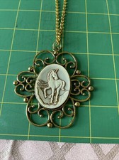 mystical necklace. unicorn. moon. costume gold tone. handmade one of a kind.