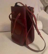Borsa a secchiello in pelle bordeaux Le Must de Cartier