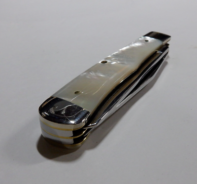 Case XX 8254 SS Mother of Pearl Trapper 4 1/8