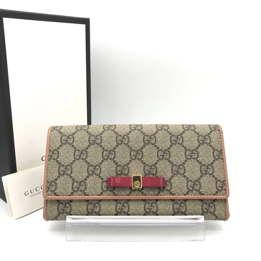 Gucci Portefeuille Gucci Ruban Gucci Bicolore GG Supreme