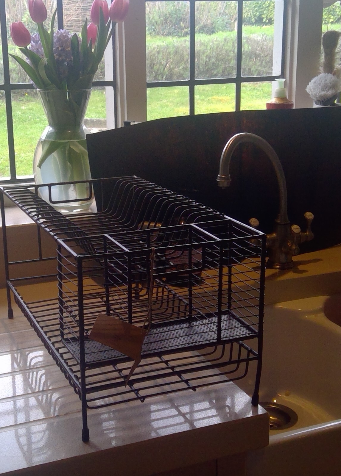 This is a Nkuku brass toned dish rack its for plates,bowls and cutlery