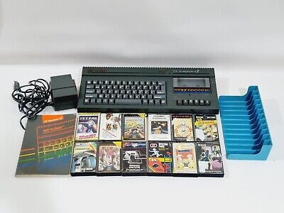 Vintage SINCLAIR 128K ZX Spectrum+ 2 Computer With 12 Tape Vintage SINCLAIR 128K ZX Spectrum+ 2 Computer With 12 Tape