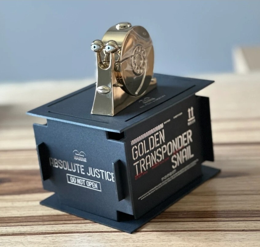 CASETiFY One Piece Collectible Golden Transponder Snail CASETiFY One Piece Collectible Golden Transponder Snail