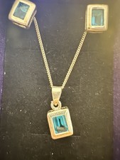 Sterling Silver Blue Topaz Necklace And Earring Set