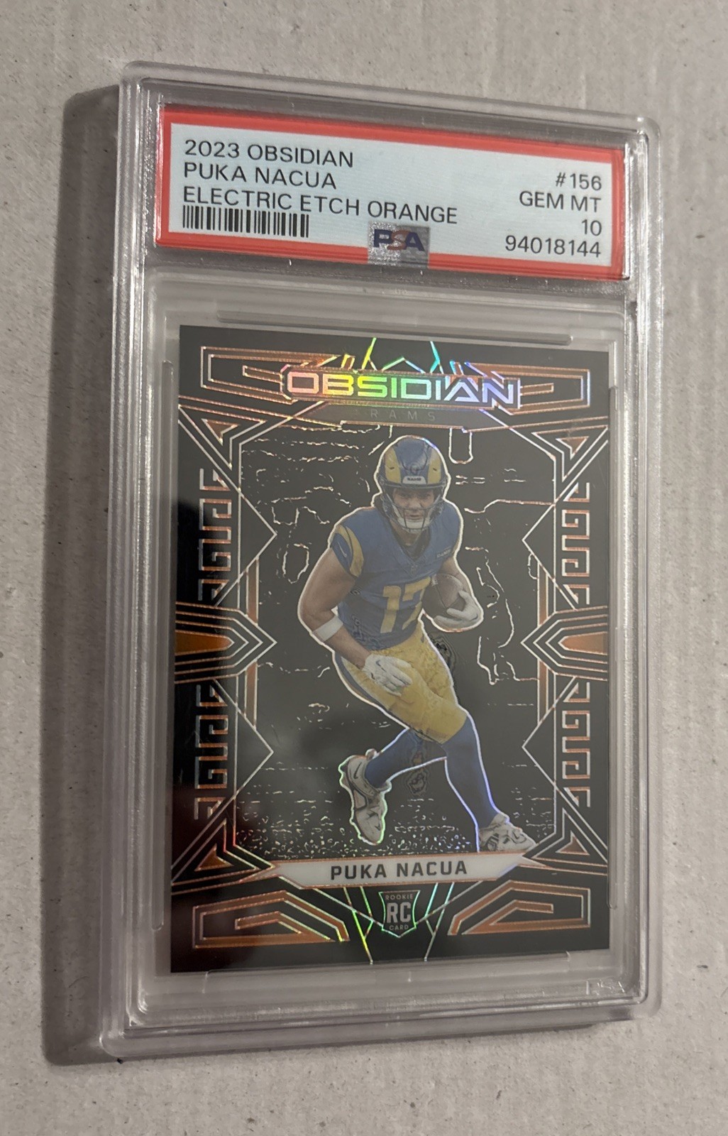 Puka Nacua Panini Obsidian #156 Electric Etch Orange