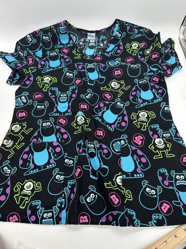 Disney Pixar Monsters Inc Scrub Top Women’s M Sulley Mike Wazowski Cotton.  3924