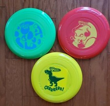 Lot of 3 Wham-O Frisbee Discs Yellow T-Rex Green Splash Red Bull NEW