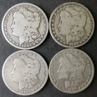 1886, 1887 O, 1889 O, and 1899 O $1 Morgan Silver Dollars