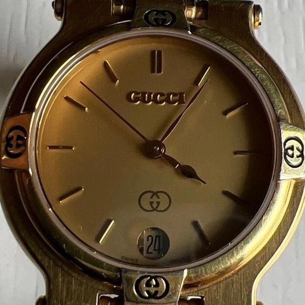 Montre homme Gucci 9200M à quartz dorée fabrication suisse excellente Japon