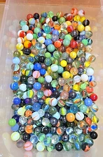 Lot of (7) Pounds Glass Marbles; Various Styles; Cat Eyes and Solid Colors