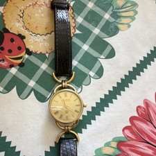 Gucci Gold Plated Analog Dress Watch Roman Numeral Dial Black Leather Strap
