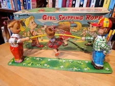 NICE 1950'S TPS TOYS TIN  WIND UP  MECHANICAL GIRL SKIPPING ROPE IN BOX