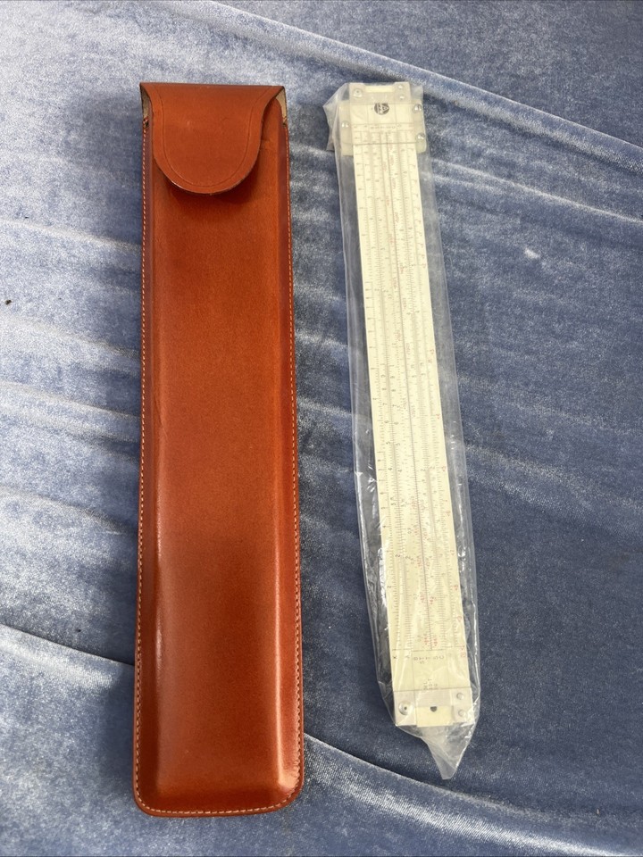 A vintage Japanese TRIG slide rule with leather case — sleek, precise, and a beautiful example of mid-century Japanese scientific craftsmanship.
