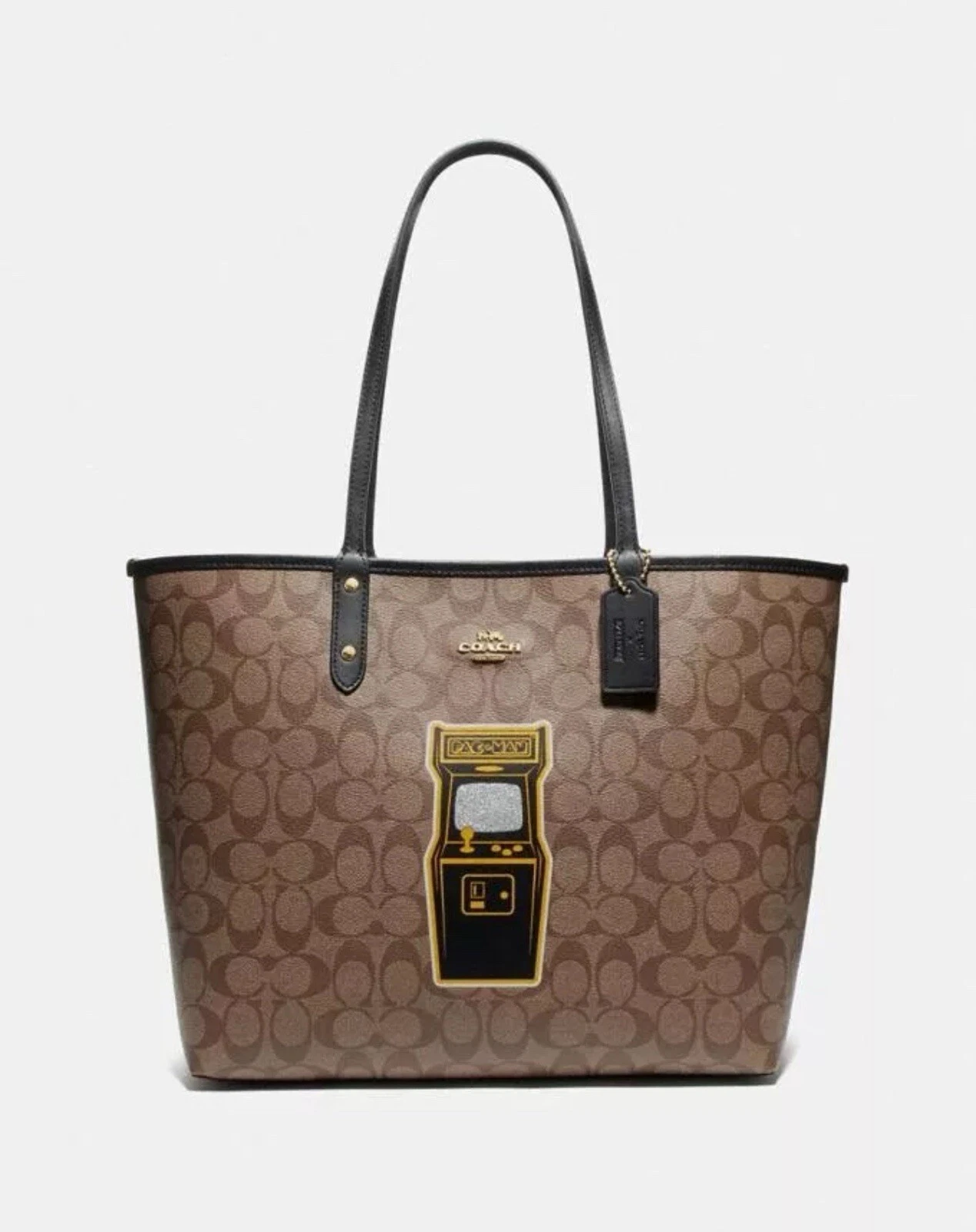 Borsa donna Coach x PAC Man reversibile da città in tela firmata con F72899