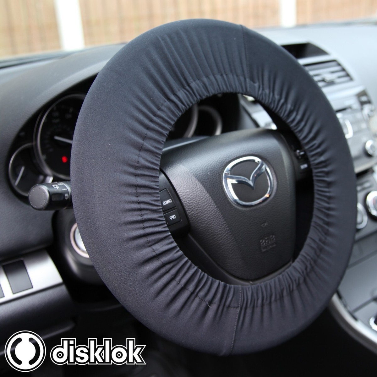 DISKLOK STEERING WHEEL COVER DISKLOK STEERING WHEEL COVER