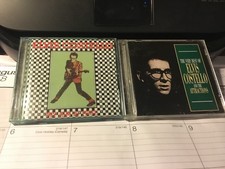 ELVIS COSTELLO 2 CD LOT: MY AIM IS TRUE AND THE VERY BEST OF ELVIS COSTELLO