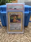 1999 POKEMON FOSSIL 1ST EDITION #4 DRAGONITE-HOLO PSA 8 NM-MT