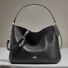 Wunderschöne schwarze Tasche von Coach, Lede...
