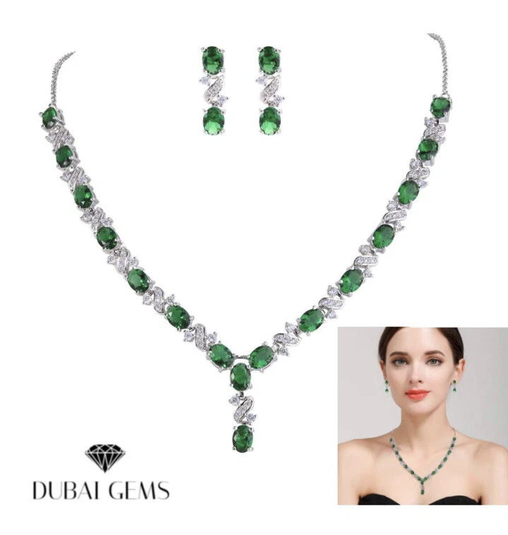 White gold finish oval cut green emerald and created diamond Necklace earrings