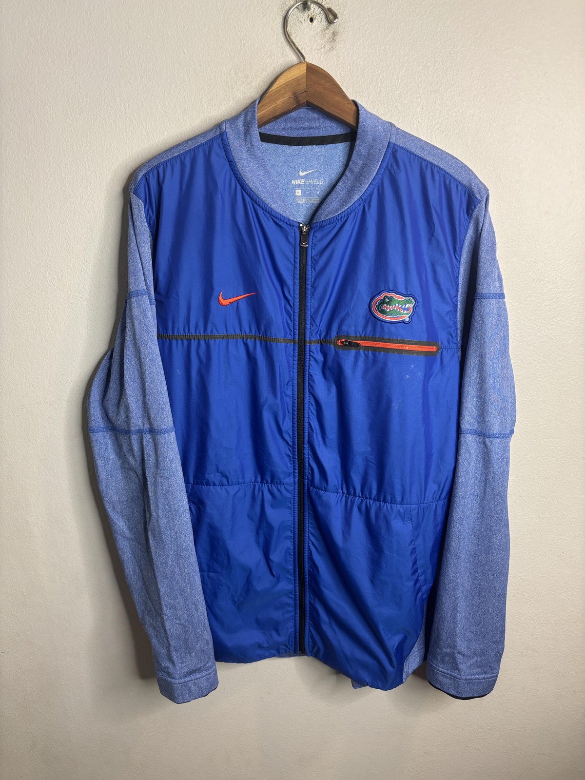 SACAI X NIKE Giacca a vento Florida Gators uomo blu medio NCAA calcio Nike Shield