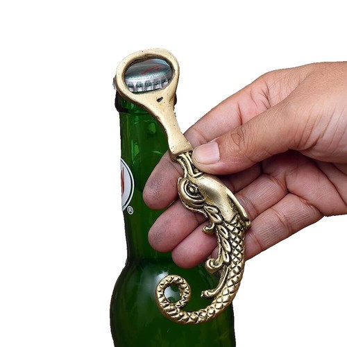 Ouvre bouteille Tiki en laiton made in England, mesure 4,5 po de long
