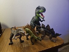 Lot of 4 Malfunctioning Dinosaur Toys, One T-Rex Two Stegosaurus 1 Allosaurus