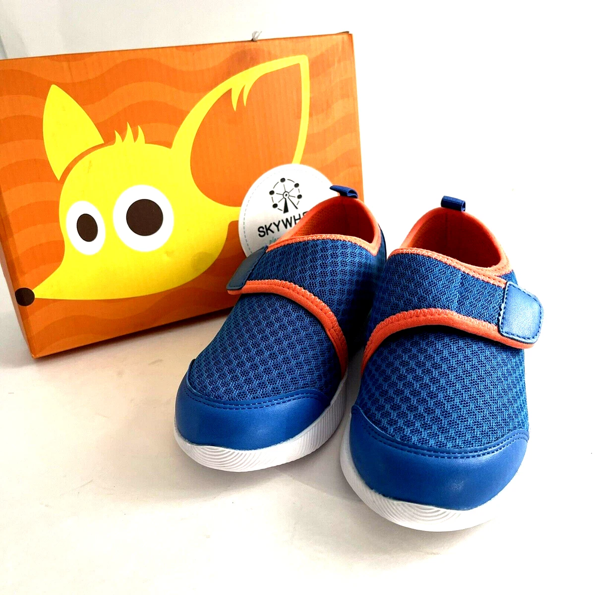 Boys blue slip on best sale shoes