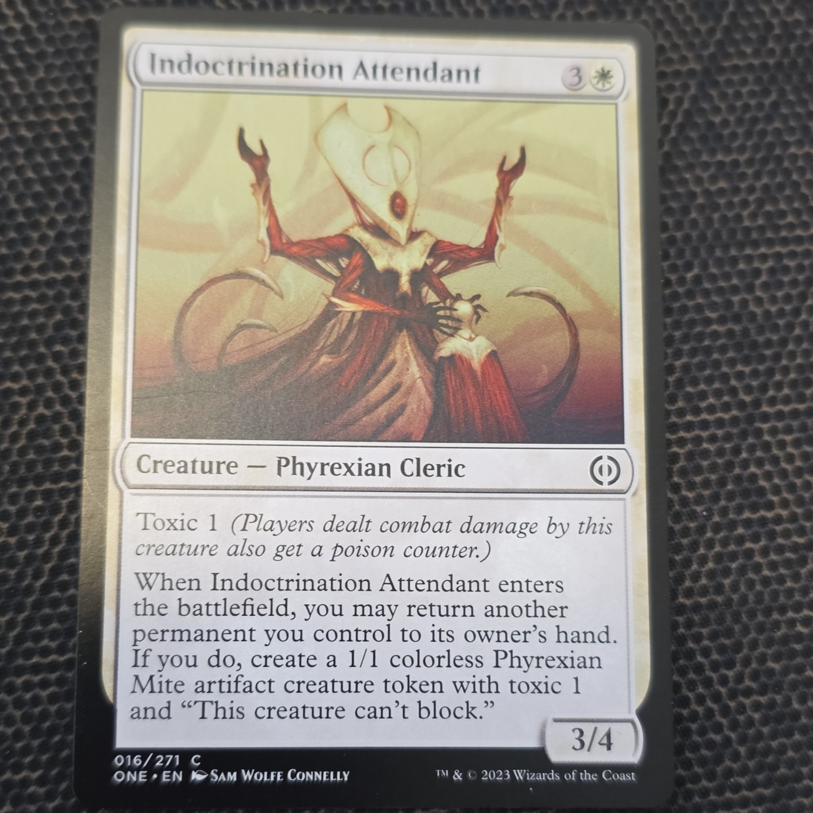 MTG Indoctrination Attendant ONE 016/271 Common Regular White EN