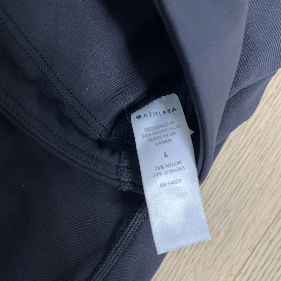 NUEVO CON ETIQUETAS Pantalones Cortos Athleta Ultimate Stash Pocket 9” Negros L Deporte Bicicleta Correr Gimnasio Foto 4 de 4