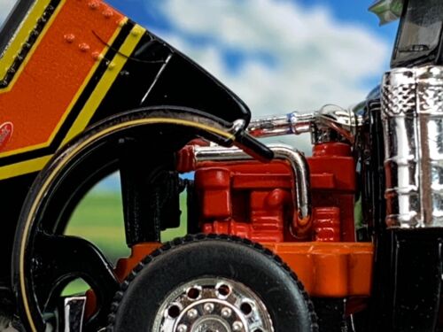1/64 DCP BLACK/ORANGE PETERBILT 389 W/ 70" MID ROOF SLEEPER - Picture 3 of 5