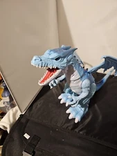 Robo Alive Roaring Ice Dragon Battery Powered Robotic Toy Lights Up Roars Moves