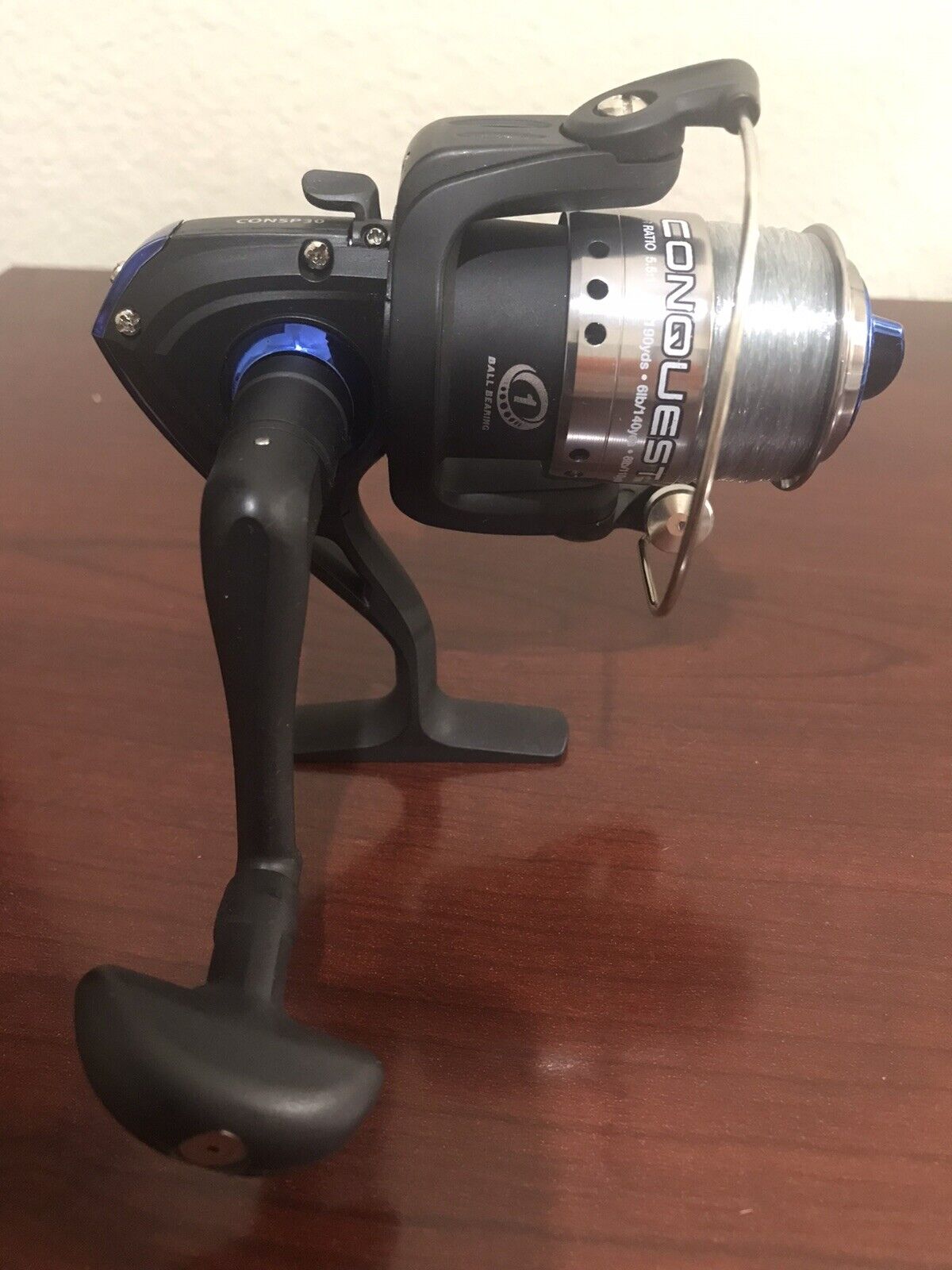 SHAKESPEARE CONQUEST - 30 SPINNING FISHING REEL WITH NEW LINE 6 LB/140 YDS MONO