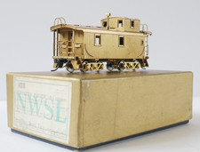 NWSL HO scale. Brass, NP 1700 series caboose. Unpainted. Made in Japan by Orion.