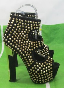 black heels gold studs