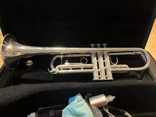Bach Bb student model trumpet,  silver, serial number 819744, repaired 