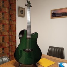 Emerald X20 Artisan Carbon Fibre acoustic guitar in Transparent Green. Stunning!