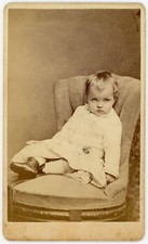 POUTY BABY POSED ON A CHAIR. TOO CUTE. PITTSBURGH, PA.