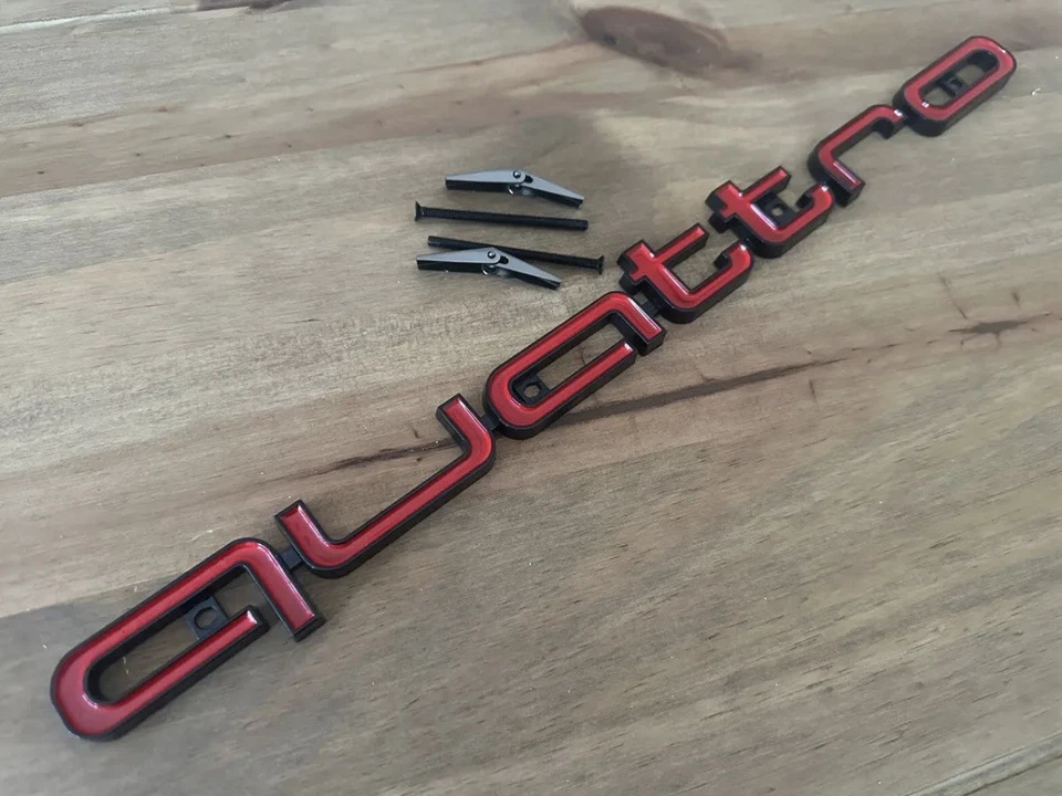 Red And Black Quattro Badge For Honeycomb Front Grill