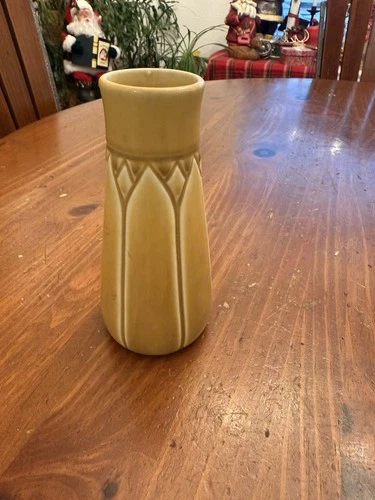 A Rookwood Pottery matte glaze production vase with relief petal decoration.