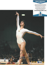 GYMNAST NADIA COMANECI SIGNED OLYMPIC GOLD MEDAL SIGNED 8X10 PHOTO 7 BECKETT COA