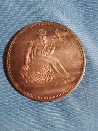 One Troy Oz .999 Fine Silver round with Seated Liberty OBV, Shield REV