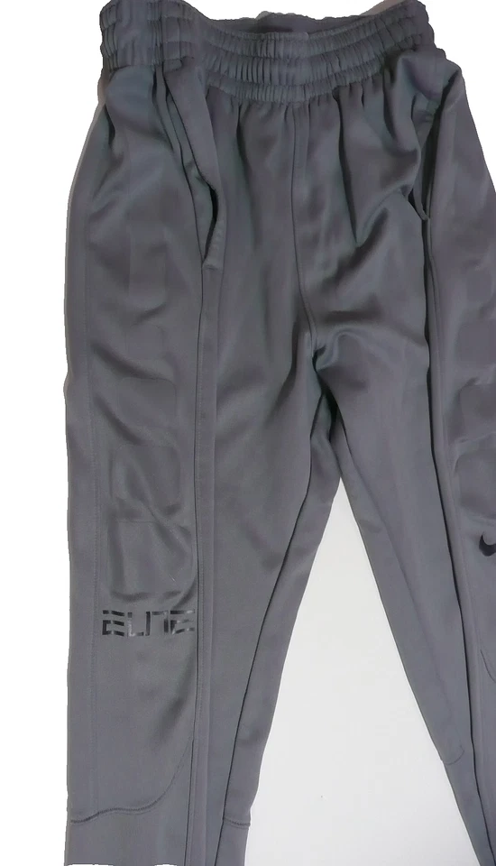 Hombres NIKE Gris Dri-Fit Joggers-Cintura Cordón-Paneles Laterales con Aplicaciones-Talla Mediana Foto 2 de 4